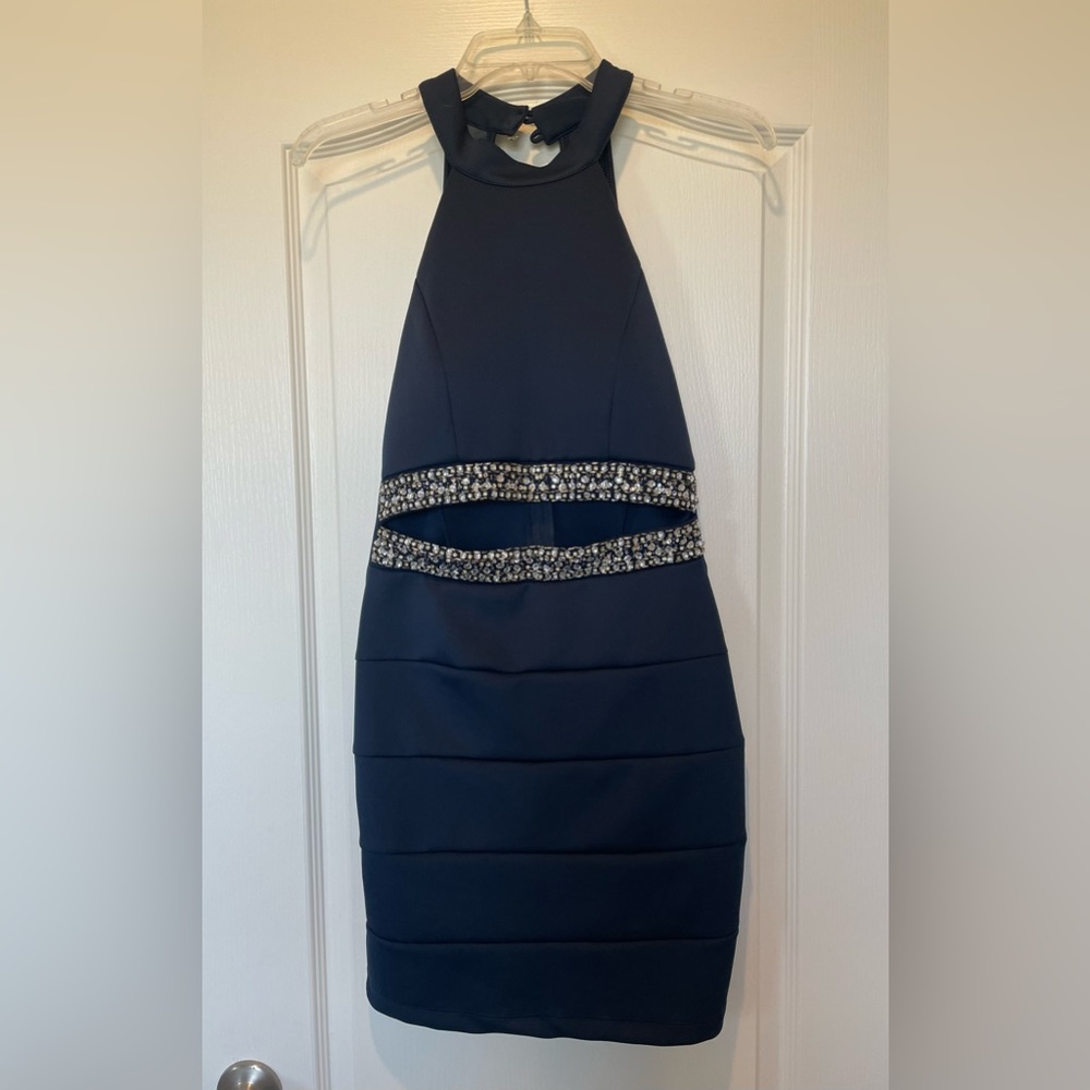 Honey and Rosie Navy Blue mini dress with sequin slit in center.